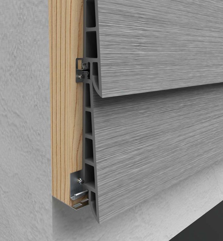 WPC siding installed, oak finish reference